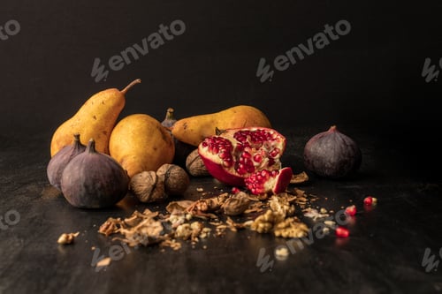 Preview: still life with organic autumnal fruits on wooden table