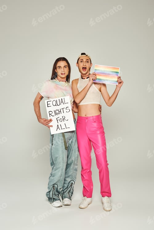 Preview: emotional and tattooed lgbt people holding rainbow flag picture and placard with equal rights for