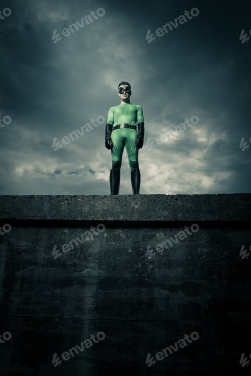 Preview: Superhero standing on a concrete wall