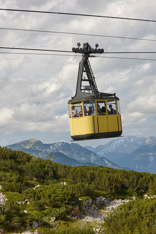 Preview: Picturesque yellow cable car in Dachstein mountain range. Austria