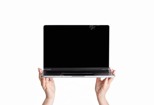 Preview: Female hands holding laptop computer with empty screen, isolated on white. Space for website