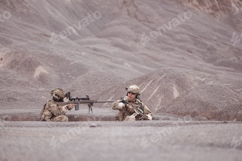 Preview: Soldiers in camouflage military uniforms carrying weapons Reconnaissance missions in rugged mountain