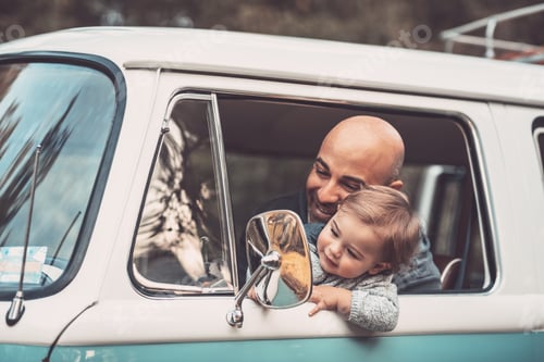 Preview: Little boy with father in the car