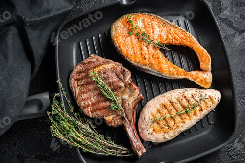 Preview: Grilled steaks. Beef rib eye, salmon and Turkey breast. Organic fish, poultry and beef meat.