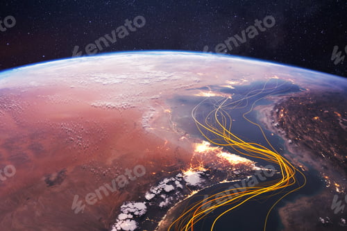 Preview: Strategic satellite view of the Strait of Hormuz at night with glowing trade routes. light trails