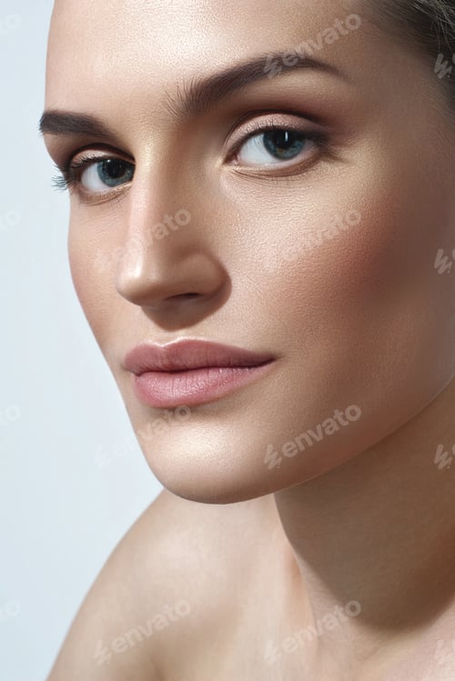Preview: Young caucasian female with natural makeup and smooth skin close-up