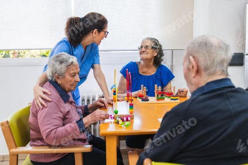 Preview: Caring nurse assisting seniors in nursing home