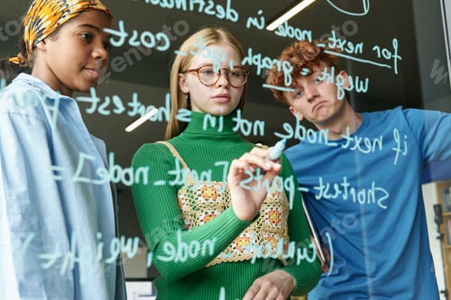 Preview: Students writing codes in teamwork