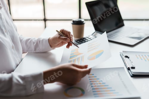 Preview: Businesswoman planning investment in a meeting. Close-up shot of business woman consultant pointing