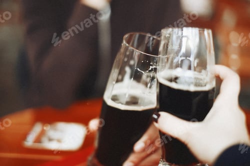 Preview: Two glasses of dark beer