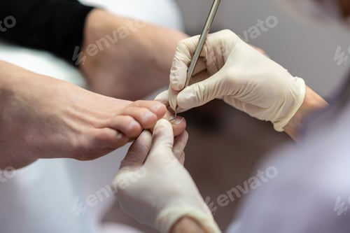 Preview: Closeup view of beautician making pedicure