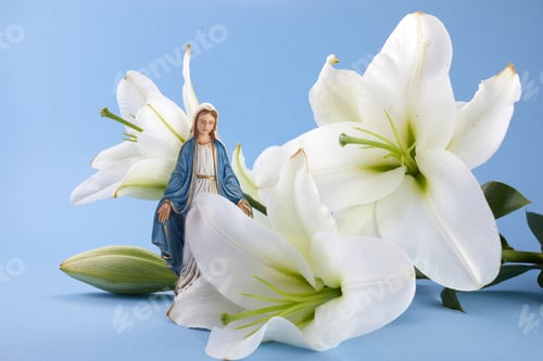 Preview: Assumption of Mary day. Virgin Mary figurine with lily flowers.