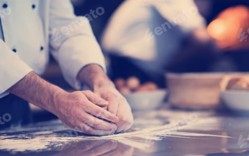 Preview: chef hands preparing dough for pizza