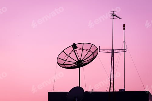 Preview: Silhouette of a Satellite dish and Television or telecommunication antenna with sky sunset twilight