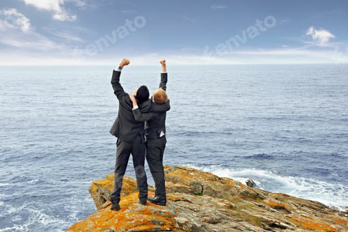 Preview: Businessmen cheering on cliff