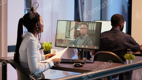 Preview: Office worker talking to manager on videocall conference