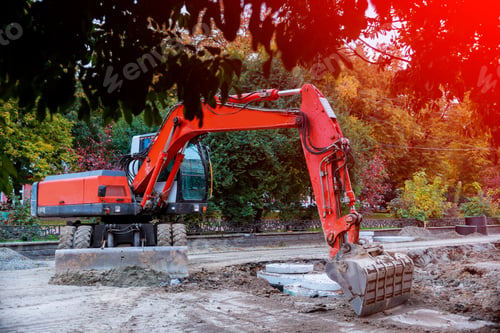 Preview: excavator digging a hole, breaking street asphalt, repairing damaged water supply pipe