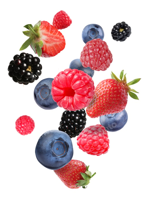 Preview: Many different berries flying on white background