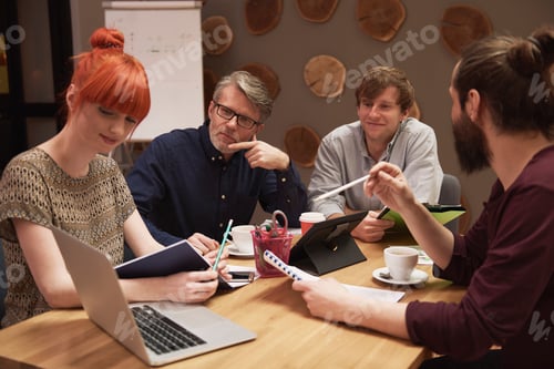 Preview: Group of business people working at the office