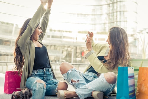 Preview: Two young women having fun in the city center