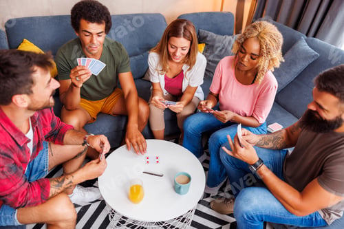 Preview: Friends having fun playing card games