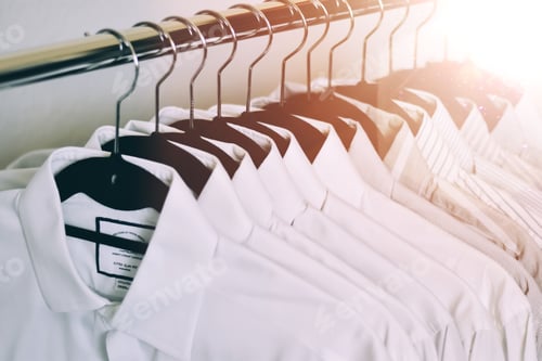 Preview: Shirts on Hangers in Clothing Store Closet