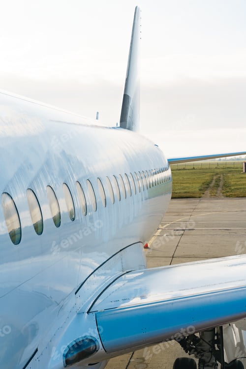 Preview: Close up of passenger airplane on the airport runway