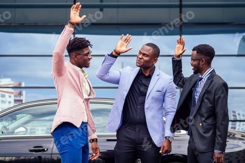 Preview: a group of their three successful African American businessmen in a stylish suit