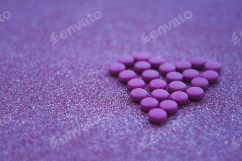 Preview: Pink purple pills heart shape, women's health.