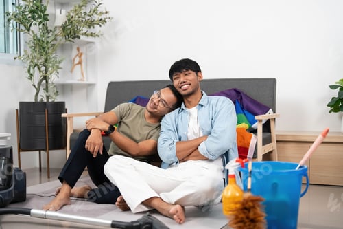 Preview: Cozy Moments and Cleaning. Two friends enjoying time together while tidying their home.