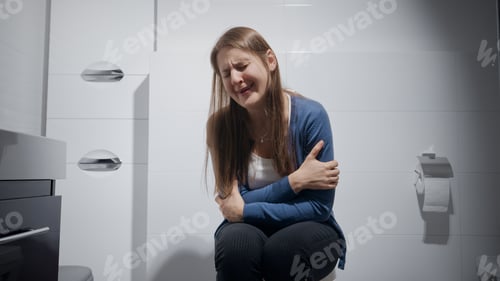 Preview: lonely woman feeling unhappy and upset crying in bathroom. Concept of depression, home violence