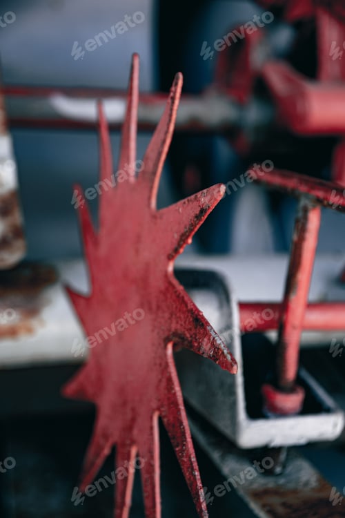 Preview: Closeup shot of rusty piece in an old agricultural machine
