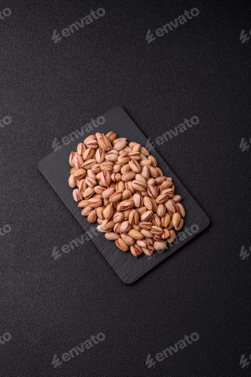 Preview: Salted pistachio nuts in shells as a healthy, high calorie food ingredient. Pistachio nuts