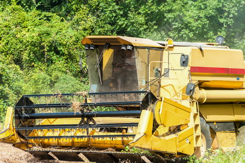 Preview: Combine harvester on a soy field