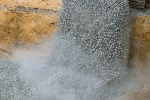 Preview: Excavator unloading gravel at construction work equipment machinery for construction of foundation