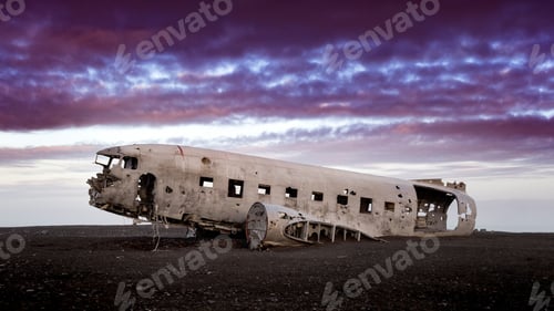 Preview: Eye-level shot of an old crashed military airplane in Iceland under the beautiful cloudy sky