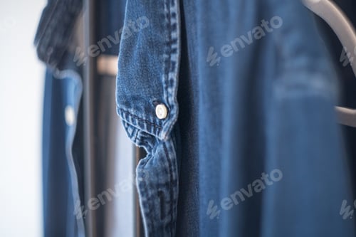 Preview: Close up of the sleeve of a denim shirt
