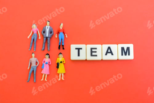 Preview: Miniature business people with text TEAM.together to collaborate, share their skills, knowledge