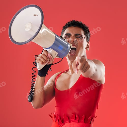 Preview: Anger, gay and portrait of a man with a megaphone isolated on a red background in a studio. Decisio