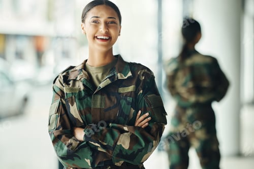 Preview: Portrait, soldier and woman with arms crossed, military and security with a smile, confident and po