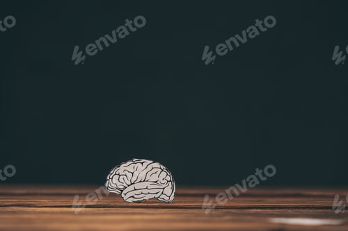 Preview: paper with brain shape as dementia symbol on black background
