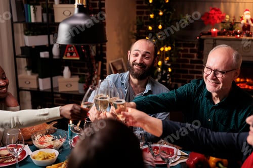 Preview: Diverse people clinking wine glasses