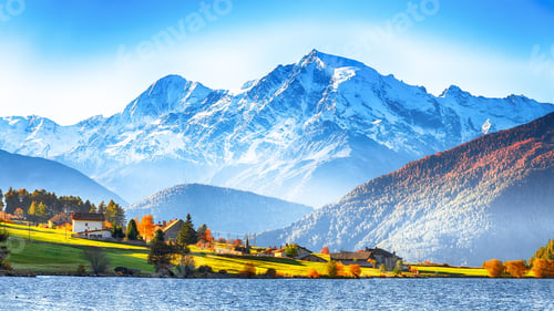 Preview: Splendid autumn panorama of Haidersee (Lago della Muta) lake with Ortler peak on backgroun