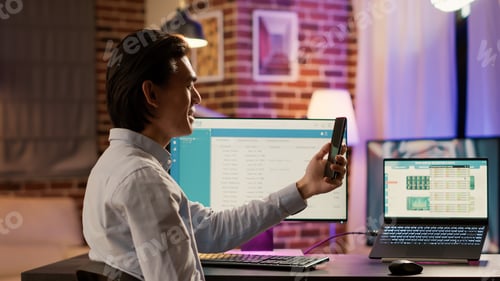 Preview: Asian businessman talking on online videocall meeting with people