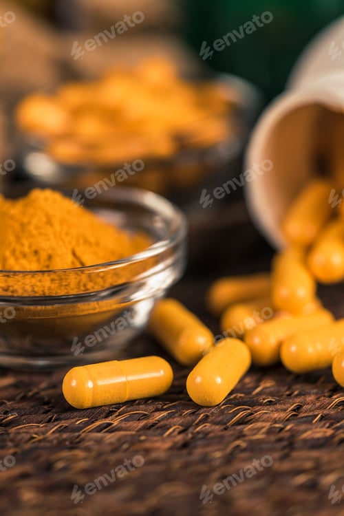 Preview: Curcumin Herbal Supplement Capsules and Turmeric Powder