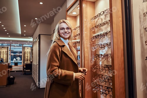 Preview: Woman is choosing new frames for glasses