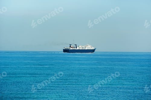Preview: A large blue ferry for the transport of goods and people goes on the Mediterranean Sea not far from