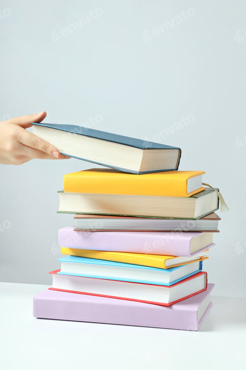 Preview: A stack of books on a light background