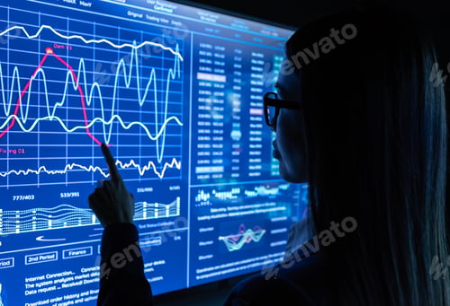 Preview: The businesswoman works with a blue sensor screen.