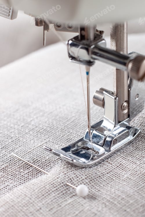 Preview: Modern Sewing Machine Presser Foot With Linen Fabric And Thread, Closeup